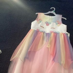 Unicorn party dress, size 8-9. Brand is Tutu & Sian. Only worn twice.